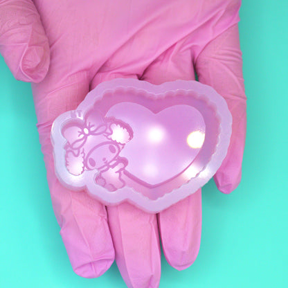 Cutie Holding Ruffle Heart Shaker Silicone Mold